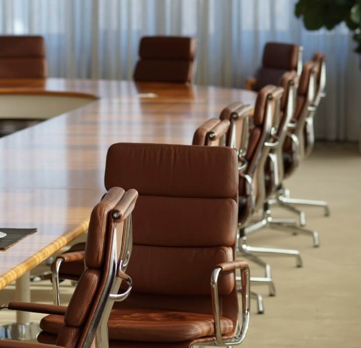 Empty office with brown leather chairs